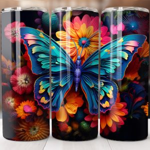 טאמבלר פרפר עם כנפיים צבעוניות יושב על פרח